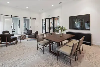 a dining room with a table and chairs at Kissimmee Oasis in Orlando