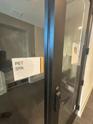 a sign that says pet spa on the side of a door at Kissimmee Oasis in Orlando