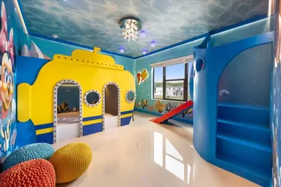 a childs room with a blue and yellow play room at 15 Bedrooms 165 Bathrooms Sonoma 4171Sb in Kissimmee