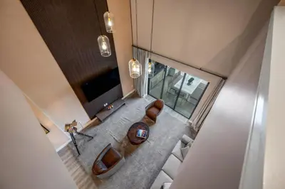 an overhead view of a bathroom with a sink and a tub at Luxury Family Townhouse Near Disney & Dining in Kissimmee