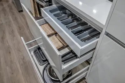 an open drawer in a refrigerator with its door open at Luxury Family Townhouse Near Disney & Dining in Kissimmee