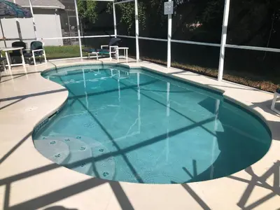 a small swimming pool with blue water at Plutospad in Orlando