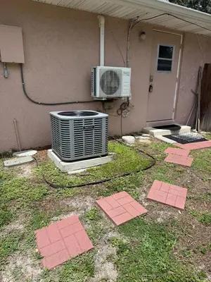 a room with an air conditioner and a heater on the ground at Cozy Modern Studio in Orlando