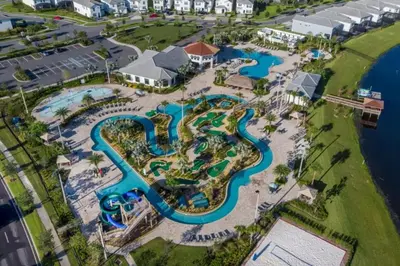 an aerial view of the water park at the resort at 3 Bedrooms 2 Bathrooms Storey Lake 3141-306 in Kissimmee