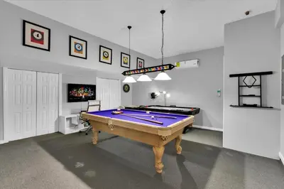 a large room with a pool table in it at AF2574 - Windsor Hills Resort Vacation Home in Orlando
