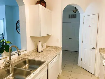 a kitchen with a sink and a counter top at Family Friendly II in Orlando