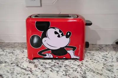 a red toaster with a cartoon mickey on it at Amazing 5BR Townhouse near Disney - Private Pool in Kissimmee