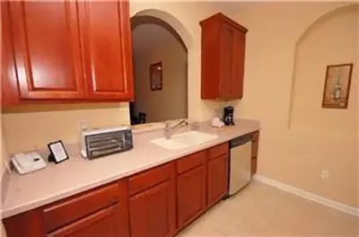 a kitchen with a sink and a counter top at 2 Bedroom private lakeview by Conference Center and Epic Universe walking distance in Orlando