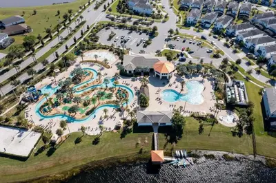 an aerial view of a pool at a resort at 4815 Townhome com Piscina Privada– Storey Lake in Kissimmee