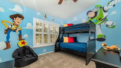 a bedroom with a bunk bed with a captain america mural at RS2508 Windsor Hills Resort 3 Bedroom Private Pool Townhome in Orlando