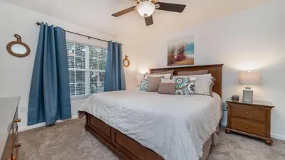 a bedroom with a bed and a ceiling fan at MNL2683 - Windsor Hills Resort Vacation Home - includes resort clubhouse amenity access in Orlando
