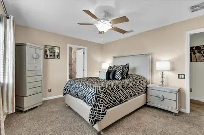 a bedroom with a bed and a ceiling fan at AF2574 Windsor Hills Resort Vacation Home - includes resort clubhouse amenity access in Orlando