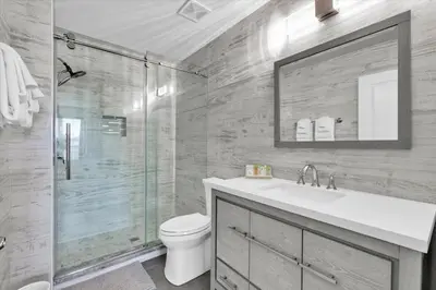 a bathroom with a toilet and a sink and a shower at AF2574-Windsor Hills Resort Vacation Home in Orlando