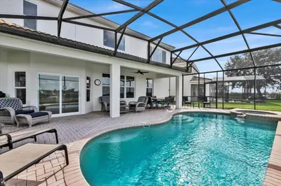 a swimming pool in a house with a patio at AF2574-Windsor Hills Resort Vacation Home in Orlando