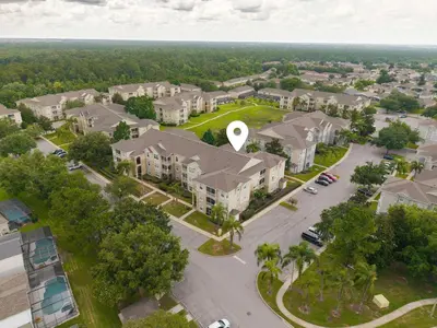 an aerial view of a residential neighborhood with houses at 3BR Resort Condo Pool Balcony Near Disney in Kissimmee