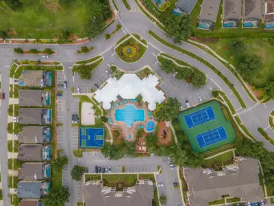 an overhead view of a building with a pool at 3BR Resort Condo Pool Balcony Near Disney in Kissimmee