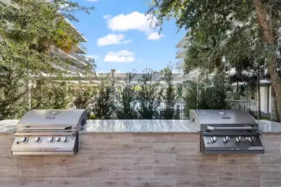 a barbecue grill with two burners on a patio at Aqua Azul Oasis in Kissimmee-minutes from Disney in Kissimmee