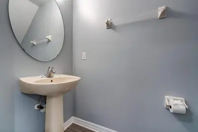 a bathroom with a sink and a mirror at Terra Verde Lakeview Escape in Kissimmee