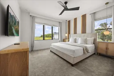 a bedroom with a bed and a ceiling fan at 15 Bedrooms 16 Bathrooms Sonoma 4151 Sb in Kissimmee