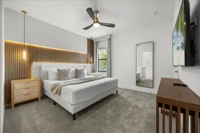 a bedroom with a bed and a ceiling fan at 15 Bedrooms 16 Bathrooms Sonoma 4151 Sb in Kissimmee