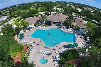an aerial view of a resort with a swimming pool at 4BRRenovateNO Resort feePrivate PoolDisney in Kissimmee