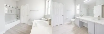 a white bathroom with two sinks and a toilet at 4BRRenovateNO Resort feePrivate PoolDisney in Kissimmee