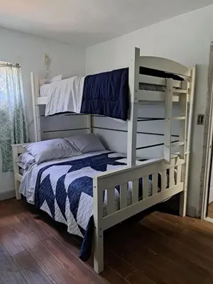 a bedroom with two bunk beds in a room at Epic Universal park neigbour 1500 feet in Orlando