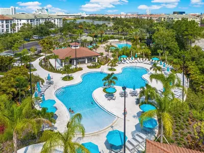 an aerial view of the pool at the resort at 3-Story sanctuary Condo in the heart of Orlando85 in Orlando