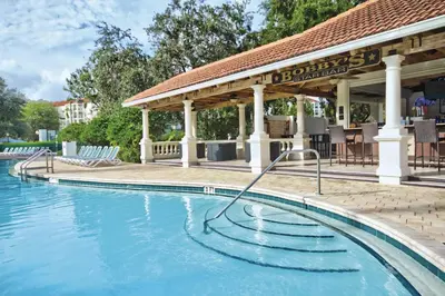 a pool at a resort with a gazebo at Wyndham Star Island Resort 1BR Apartment with Resort Access in Kissimmee