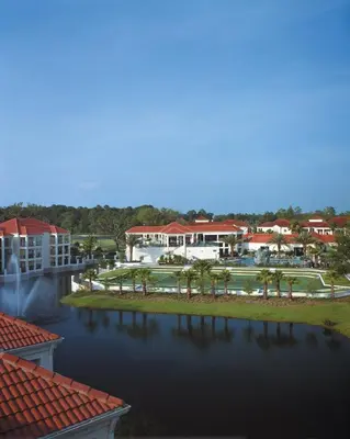 arial view of a resort with a body of water at Wyndham Star Island Resort 2BR Apartment with Resort Access in Kissimmee