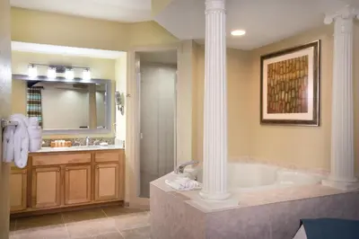 a large bathroom with a tub and a shower at Wyndham Star Island Resort 3BR Apartment with Resort Access in Kissimmee