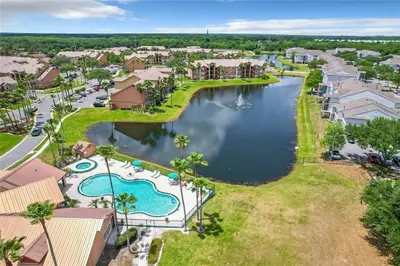 an aerial view of a resort property with a river at Adventure's at Villa Del Sol in Kissimmee