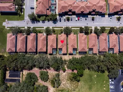 an overhead view of a building with a red heart on the roof at Casa de Kissimmee Sleeps up to 13 Guests in Kissimmee