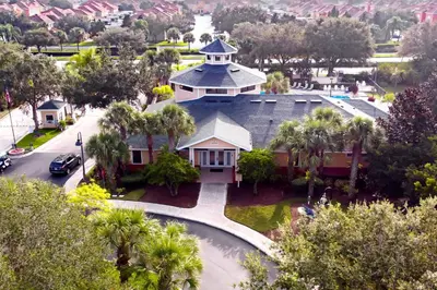 an aerial view of a house with palm trees at Cozy Cove - Caribe Escape for 8 in Orlando
