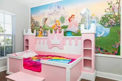a childs bedroom with a pink and white castle bunk bed at Wonderland at White Crane - Hot tub & Lake views in Orlando