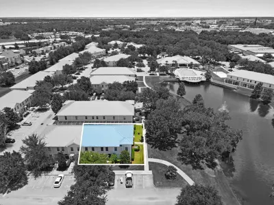 an aerial view of a town with a river at Family Friendly Relax Villa in Kissimmee