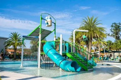 a water park with a slide in the water at Veranda Sunshine Escape - 5 BDR in Kissimmee