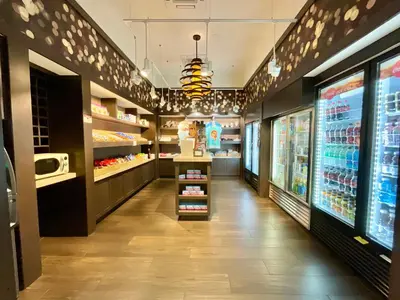 a store aisle of a grocery store with food on display at Minutes to Magic in Orlando