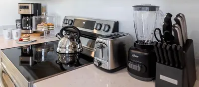 a kitchen with a counter with a blender on it at No Way Rose - Nearby Disney World & Universal in Orlando