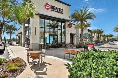 a berkoco store with chairs and tables in front of it at No Way Rose - Nearby Disney World & Universal in Orlando