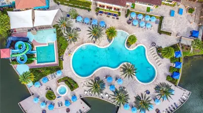 an overhead view of a pool at a resort at Orlando's Heartland with Amenities in Kissimmee