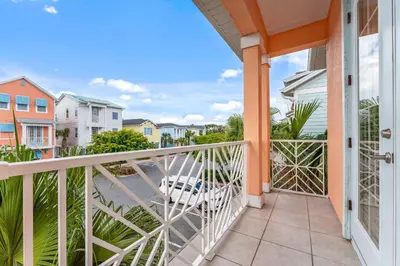 a balcony with a view of condos at Parrot Paradise Escape for 8 in Orlando