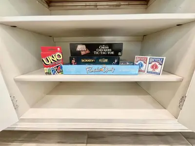 a shelf in a refrigerator filled with lots of snacks at Parrotfish Place - Stay for 6 in Orlando