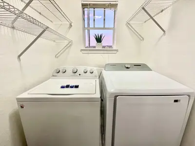 a kitchen with a stove and a refrigerator at Playing Hooky in Kissimmee
