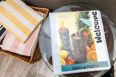 a magazine sitting on top of a glass table at Rum Runners and Margaritas in Orlando
