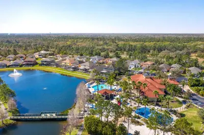 an aerial view of a resort with a lake at Terra Verde - Resort Amenities & More in Kissimmee