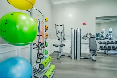 a fitness room with a gym with exercise equipment at Conforto e Estilo | 3Q Piscina & Resort in Orlando