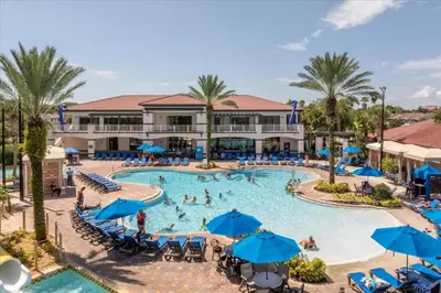 an overhead view of a pool at a resort at Cozy Townhome in Fantasy World Near Parks in Kissimmee