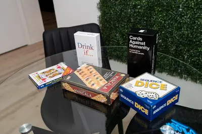 a table topped with boxes of food on a table at Eola Retreat Private Hot Tub with Grill in Orlando