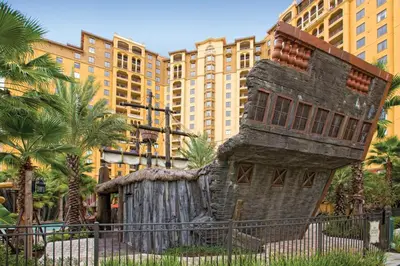 a play house in front of a tall building at Wyndham Bonnet Creek 2BR Apartment with Resort Access in Orlando
